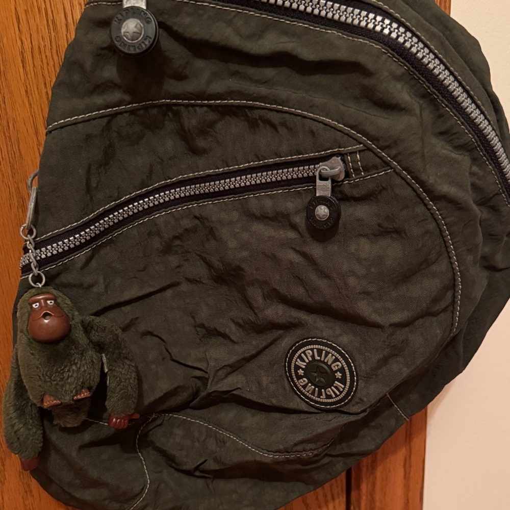 Kipling Olive Green Over the Shoulder Backpack with Monkey Charm